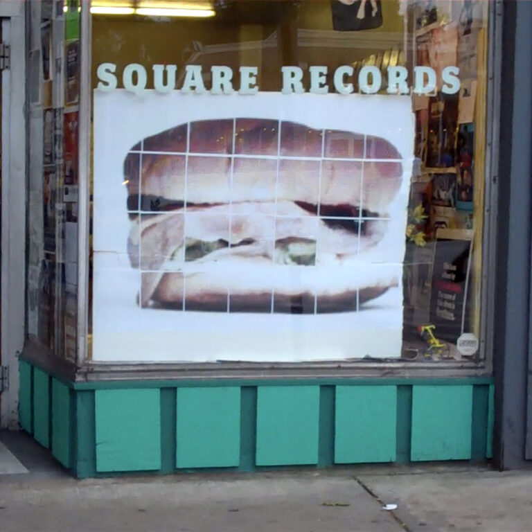 Picture showing the Nitemare rasterbator in the front window of Square Records